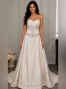 Strapless Ivory Wedding Dress with Beaded Waist Embellishment and train